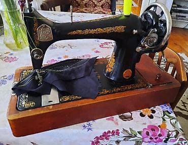 qedimi radio: Mexanik tikiş maşını – antik dizaynlı, əl çarxlı model — 1