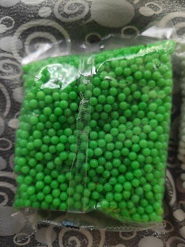 Plastik Airsoft gulleler 6mm ölcude paketde 2000 eded olur. 20 azn