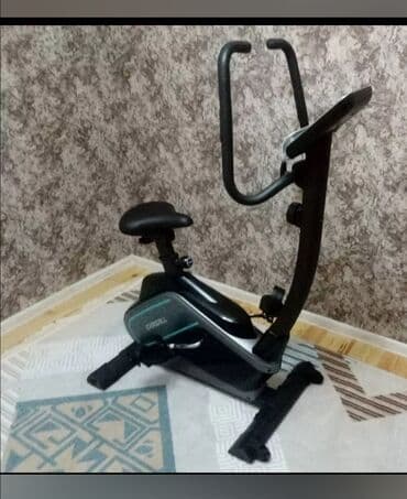 Elliptik trenajorlar: Bu, evdə istifadə üçün nəzərdə tutulmuş stasionar məşq velosipedidir
