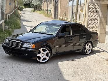 bmw 528 1996: Mercedes-Benz C 230: 2.3 l | 1999 il Sedan — 2