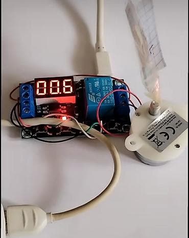 İnkubatorda yumurta çevirən motor . Elektron taymer və rele modulu — 1