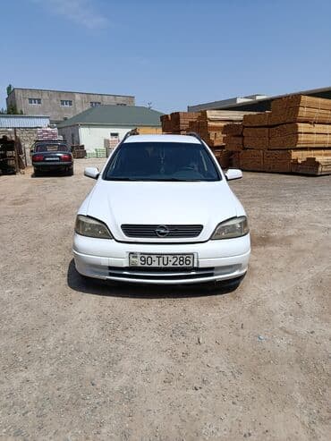 kvadrasikl satışı: Ətraflı məlumat üçün zəng edin, vatsapa yazın.Opel Astra Caravan — 1