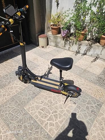 Elektrik nəqliyyatı: Elektrikli skuter – oturacaqlı model Xüsusiyyətlər: - Güclü ön ikili — 2