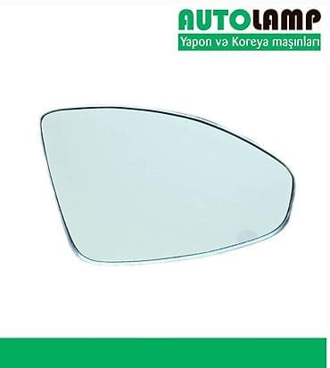 Chevrolet Cruze 2009 yan guzgu ici . Chevrolet Cruze 2010 qabaq sag (