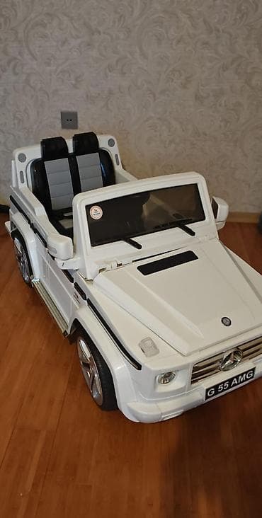 oyuncaq masınlar: Uşaq üçün elektrikli minik maşını – ağ rəng, “G 55 AMG” üslubunda — 1