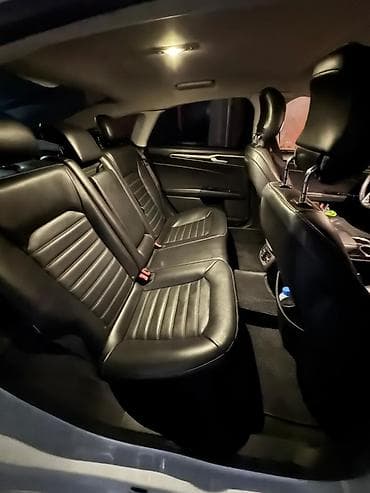 balansera kardan: Ford Fusion sedan – ağ rəng, geniş salon və iri baqaj. idiyal — 3
