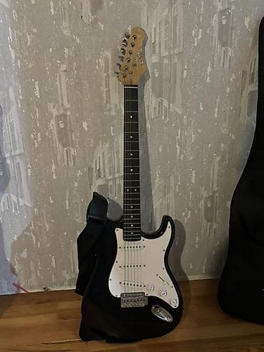 elektro gitarlar: Elektro gitar – Eko (Est. 1959) brendi, Strat tərzi gövdə dizaynı - — 2