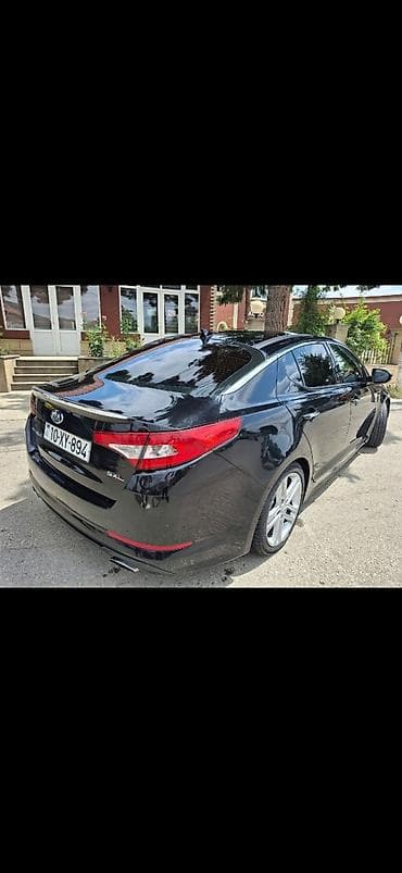 2014 toyota corolla: Kia Optima SXL – sedan - Rəng: qara, SXL komplektasiya - Kuzov: 4 — 7