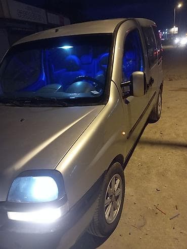 bmw i8 satilir: Fiat Doblo miniven Xüsusiyyətlər: - Gümüş rəngli kuzov, 5 qapı (yan — 6