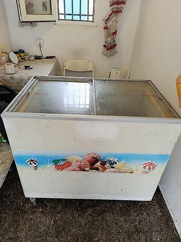 Кухонные вытяжки: Стеклянный морозильник — 7