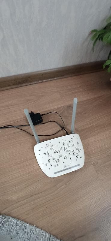 tikanlı tel: TP-Link Wi‑Fi marşrutizatoru Xüsusiyyətlər: - İki ədəd yüksək — 1