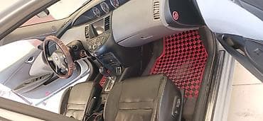 qezalı maşın: Nissan Primera: 2 l | 2002 il Universal — 10