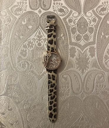 Qadın qol saatı - Üslub: Zərif və dekorativ dizayn, leopard naxışlı