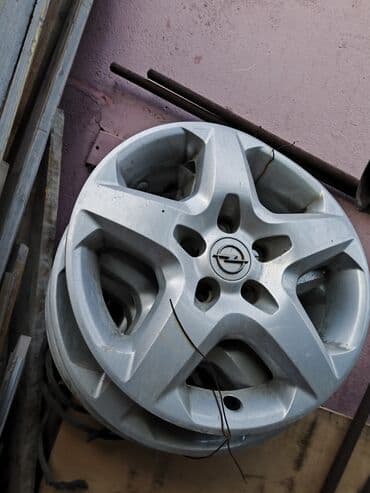 опель запчасти: Opel təkər diski (rezin qapaq/kalpak) – orijinal dizayn - Marka: Opel — 1