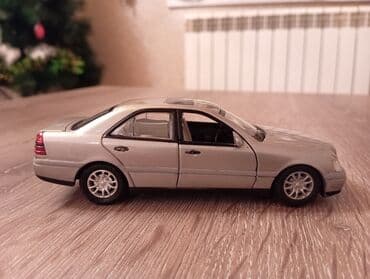 Книги и журналы: Mersedes c 220 modeli kitay istehsalı 1/36 ölcüdədəir .Bu modeli Öz — 3
