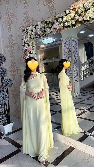 Zərif sarı rəngdə uzun ziyafət geyimi. - Model: asimmetrik bir çiyin