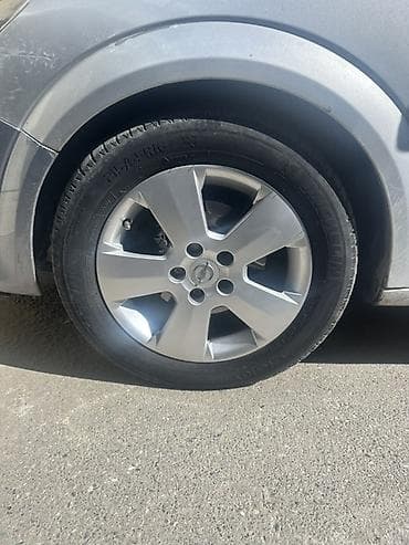 disk lada: Opel astra üçün orijinal 16 düymlük yüngül lehimli disk və şin — 1