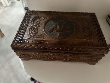 Oyma naxışlı taxta qutu

Quran qabı