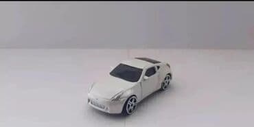 ayı çanta: Təcili Satılır. Endirim Var. Nissan 370z Cupe modelka satılır.Ağ — 1