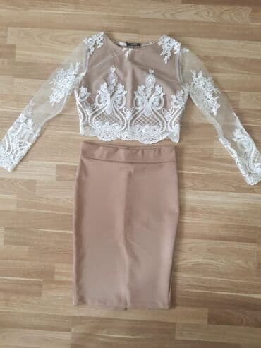 yupqa kofta: Naxışlı ağ krujeva detalları olan bej rəngli qısa kofta. 34 razmerə — 3