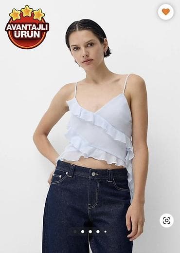 Açıq mavi rəngdə qadın topu - Model: nazik qayışlı, V-yaxa - Dizayn — 1