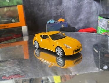 metbex tavan modelleri: Коллекционная модель Nissan 370Z Z34 yellow 2008 DeAgostini Scale — 4