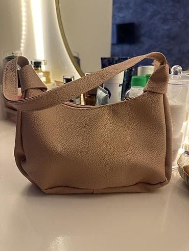 Qadın çantaları – 2 model 1) cehrayi rəngli çiyin çantası - Yumşaq