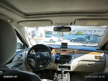cəliloğlu avto: Mitsubishi Lancer sedan – gümüşü rəng, qara disklər. Nömrə: 77-NE-396 — 7