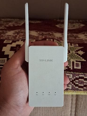 router modem: TP-Link RE210 – AC750 Wi‑Fi Siqnal Gücləndirici — 1