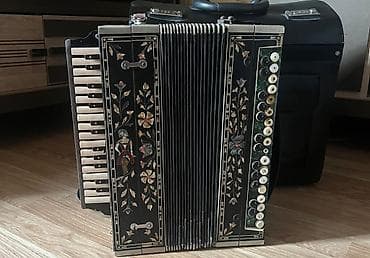 Аккордеоны: Akkordeon – dekorativ naxışlı, pianino klavişli model - Ön paneldə — 1