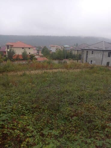 xacmazda torpaq satilir: 444 Otelin arxasında yerləşən torpaq sahəsi - Ümumi sahə: 5.5 sot - 2 — 3