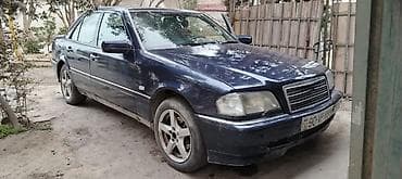s class: Mercedes-Benz C‑Class sedan (W202), tünd mavi rəng. - Kuzov: 4 qapılı — 3