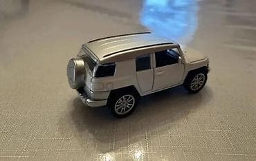 at oyuncaqlari: Ağ rəngli metal oyuncaq ofroud SUV maketi. - Material: die-cast metal — 4