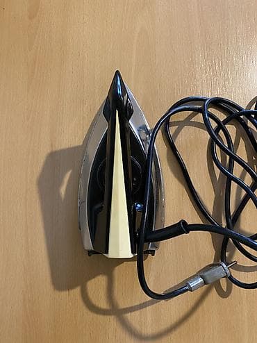 braun utu: -Sovet vaxtinin elektrik ütüsü. islek veziyyetde 
Whtsp var — 4