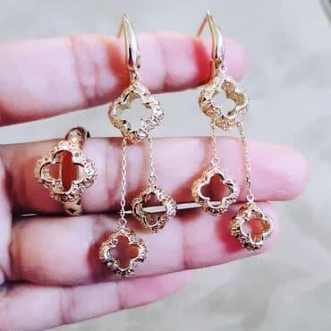 750 əyar qızılın alış qiyməti: Dəstə daxildir: Üzük, Sırğa, Sarı qızıl, 585 Əyar, 811 g — 2