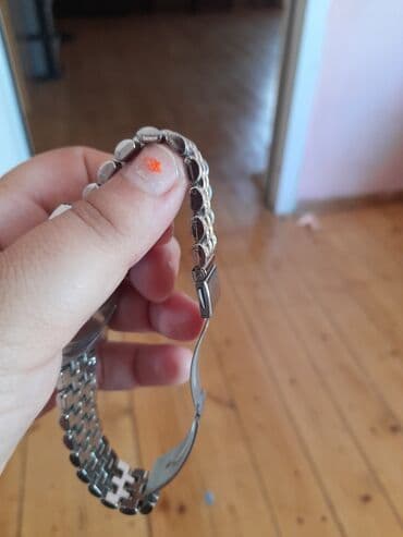 irshad telecom is saatlari: Bəzəkli kvars mexanizmli, dairəvi formalı kristal saat. Roma rəqəmləri — 2