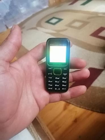 телефон fly q200: Mini düyməli telefon – Kgtel Mini B310 Xüsusiyyətlər: - Ultra-kompakt — 2