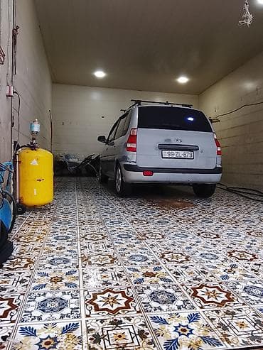 nolyedi sekilleri: Hyundai Matrix: 1.5 l | 2006 il Van/Minivan — 9