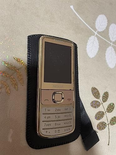 nokia 6700 satilir: Nokia 6700 Slide, rəng - Qızılı, Düyməli — 4