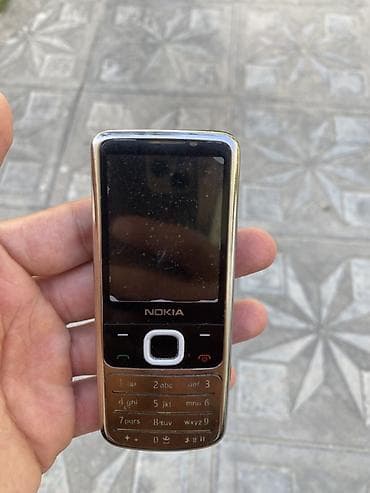 Nokia 6700 Slide, rəng - Gümüşü, Düyməli lalafo.az -da Nokia 6700 Slide, rəng - Gümüşü, Düyməli
