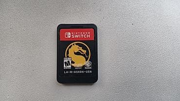 Nintendo Switch (neon mavi/qırmızı Joy‑Con) - Model: Nintendo Switch — 7