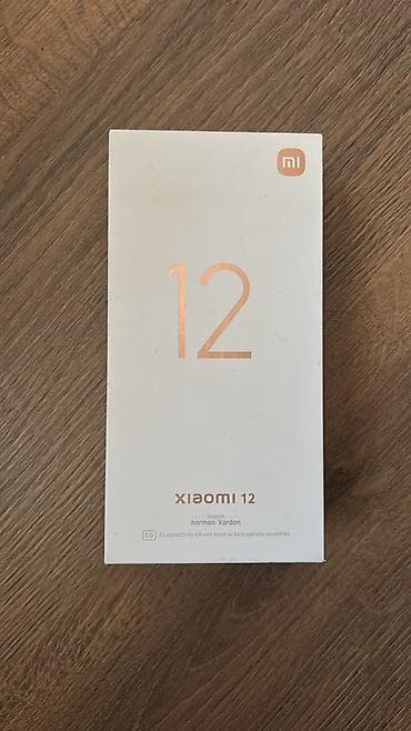 philips xenium 9@9u: Xiaomi 12, 256 GB, rəng - Gümüşü, 
 Sensor — 4