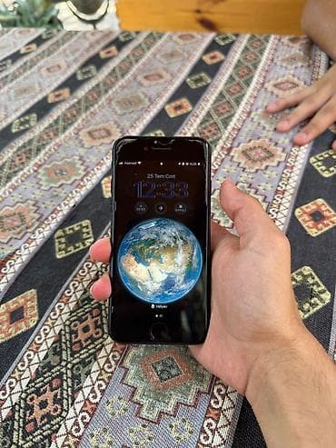 fly e147 tv: IPhone SE 2022, 64 GB, Qara, Barmaq izi — 1