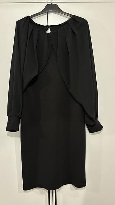 Qara rəngdə zərif qadın paltarı Alan şəxsə endirim ediləcək. Ortaq