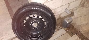 i30 disk: 195/65/15 lçülü, qara rəngli avtomobil təkəri polad disklə birlikdə — 1