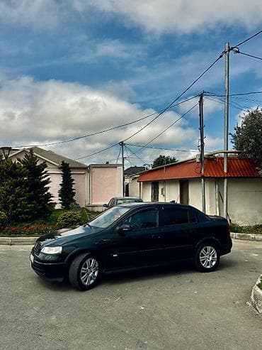 lada vaz 2101: Opel Astra: 1.6 l | 1999 il 400 km Sedan — 8