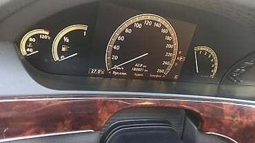 mercedes benz cl class: Mercedes‑Benz S-Class sedan (W221), qara rəng, V12 emblemli. Xarici — 9