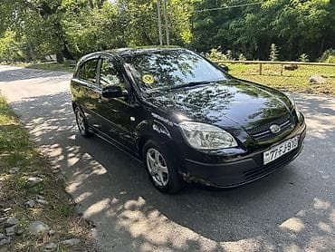 niva 4 qapı: Kia Rio: 1.4 l | 2006 il Hetçbek — 1