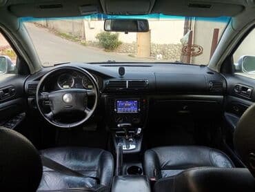 avtobus oturacaq: Volkswagen Passat: 1.8 l | 2003 il Sedan — 6