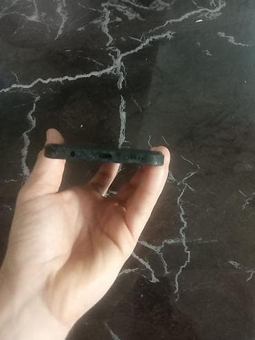 Мобильные телефоны и аксессуары: Barter. var.Qara rəngli, naxışlı arxa örtüyə malik smartfon. Cihazın — 4